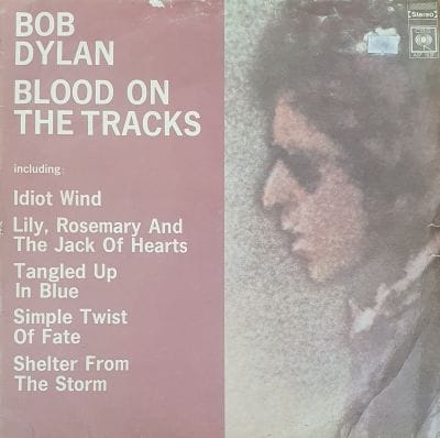 BLOOD ON THE TRACKS (SOUTH AFRICAN PRESSING) (USED VINYL) (COVER CONDITION FAIR)